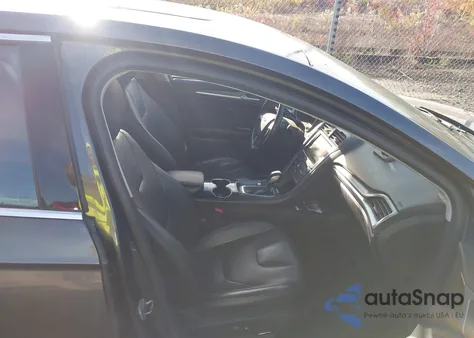 2016 Ford Fusion Titanium из США, поврежденный, VIN 3FA6P0K98GR150715